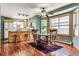 Bright dining area with hardwood floors and a table for four at 4720 W 37Th Ave # 29, Denver, CO 80212
