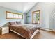Cozy bedroom with a double bed, window, and light walls at 4720 W 37Th Ave # 29, Denver, CO 80212