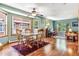 Bright dining area with hardwood floors and a charming wooden table set at 4720 W 37Th Ave # 29, Denver, CO 80212