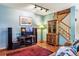 Comfortable living room with hardwood floors, TV, and ample natural light at 4720 W 37Th Ave # 29, Denver, CO 80212