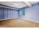 Spacious basement with neutral walls and carpet at 4720 W 37Th Ave # 29, Denver, CO 80212