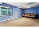 Finished basement with neutral colored walls and carpet at 4720 W 37Th Ave # 29, Denver, CO 80212