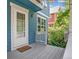 Small deck and blue exterior house with white door at 4720 W 37Th Ave # 29, Denver, CO 80212