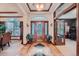 Elegant entryway with hardwood floors and stained glass door at 7454 Cameron Dr, Larkspur, CO 80118