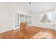 Sunroom with hardwood floors and French doors at 2437 Santa Fe Dr # A, Longmont, CO 80504