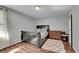 Bedroom with dark wood platform bed and dresser at 2160 S Vaughn Way # 304C, Aurora, CO 80014