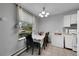 Small dining area with table and chairs near kitchen at 2160 S Vaughn Way # 304C, Aurora, CO 80014