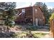 Two-story home with wooden siding and deck at 76 Wonderland Ave, Golden, CO 80403