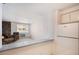 Kitchen with breakfast bar overlooking living room at 801 N Pennsylvania St # 405, Denver, CO 80203