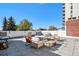 Shared rooftop patio with seating and city views at 801 N Pennsylvania St # 405, Denver, CO 80203