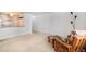 Living room with kitchen view and comfortable seating at 801 N Pennsylvania St # 405, Denver, CO 80203