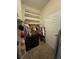 Large walk-in closet with ample shelving and hanging space at 15455 Canyon Rim Dr # 307, Englewood, CO 80112