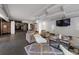 Modern building lobby with comfortable seating and large TV at 410 Acoma St # 303, Denver, CO 80204