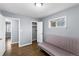 Inviting bedroom with hardwood floors, a futon, and a closet at 119 S 8Th Ave, Brighton, CO 80601