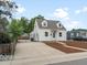 Cute bungalow with newly paved driveway and updated landscaping at 4835 Shoshone St, Denver, CO 80221