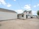 View of the detached garage and large backyard at 4835 Shoshone St, Denver, CO 80221