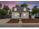 Charming cape cod home with a well-maintained front yard at 4835 Shoshone St, Denver, CO 80221