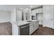 Modern kitchen with island and stainless steel appliances at 3442 N Gold Bug Ct, Aurora, CO 80019