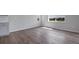 Charming dining area with large windows and hardwood floors at 3442 N Gold Bug Ct, Aurora, CO 80019