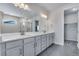 Double vanity bathroom with a walk-in shower at 3442 N Gold Bug Ct, Aurora, CO 80019