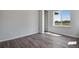 Bright home office with a large window and hardwood floor at 3442 N Gold Bug Ct, Aurora, CO 80019