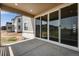 Covered patio with sliding glass doors and view of backyard at 3442 N Gold Bug Ct, Aurora, CO 80019