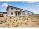 Two-story home with covered patio and large backyard at 3442 N Gold Bug Ct, Aurora, CO 80019