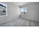 Spacious bedroom with large window and carpet at 3442 N Gold Bug Ct, Aurora, CO 80019