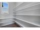 Walk-in pantry with ample shelving at 3442 N Gold Bug Ct, Aurora, CO 80019