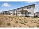 Two-story home with covered patio and large backyard at 3442 N Gold Bug Ct, Aurora, CO 80019