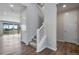 Modern staircase with light gray carpeting at 3442 N Gold Bug Ct, Aurora, CO 80019