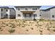 Two-story home with covered patio and large backyard at 3442 N Gold Bug Ct, Aurora, CO 80019