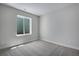 Unfinished basement bedroom with carpet and a window at 3442 N Gold Bug Ct, Aurora, CO 80019