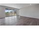 Spacious living room with sliding glass doors to patio at 3442 N Gold Bug Ct, Aurora, CO 80019