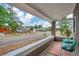 Cozy front porch with seating area and street view at 4242 Pecos St, Denver, CO 80211