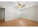 Bright bedroom with wood flooring and a ceiling fan at 8019 Wolff St # G, Westminster, CO 80031