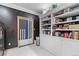 Organized storage room with ample shelving and a safe at 17075 Viscount Ct, Monument, CO 80132