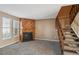 Living room with fireplace and carpeted floors at 17138 E Whitaker Dr # C, Aurora, CO 80015