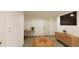 Relaxing basement recreation area with beanbag chair and media console at , Aurora, CO 80019