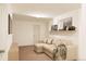 Comfortable basement sitting area featuring a sectional sofa and neutral decor at , Aurora, CO 80019