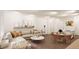 Open concept living room and kitchen with island, hardwood floors, and neutral colors at , Aurora, CO 80019