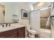 Clean bathroom with shower/tub combo and updated vanity at 14969 Elsinore Ave, Parker, CO 80134