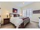 Charming bedroom with a queen-size bed and southwest decor at 14969 Elsinore Ave, Parker, CO 80134