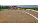 Community playground with slides, climbing structures, and play area at 14969 Elsinore Ave, Parker, CO 80134