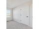 Bright bedroom with carpeted floor and large window at 1120 Joseph Pl, Erie, CO 80026