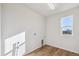 Laundry room with linoleum flooring and window at 1120 Joseph Pl, Erie, CO 80026