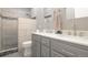 Bathroom with double vanity, large shower, and tile flooring at 41860 Muirfield Loop, Elizabeth, CO 80107