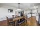 Elegant dining area with hardwood floors and a chandelier at 41860 Muirfield Loop, Elizabeth, CO 80107