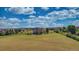 Aerial view of house and large backyard at 41860 Muirfield Loop, Elizabeth, CO 80107