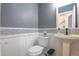 Modern powder room with pedestal sink and gray walls at 41860 Muirfield Loop, Elizabeth, CO 80107